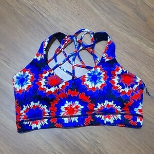 Constantly Varied Gear red, white, and blue firewo sports bra, size small.